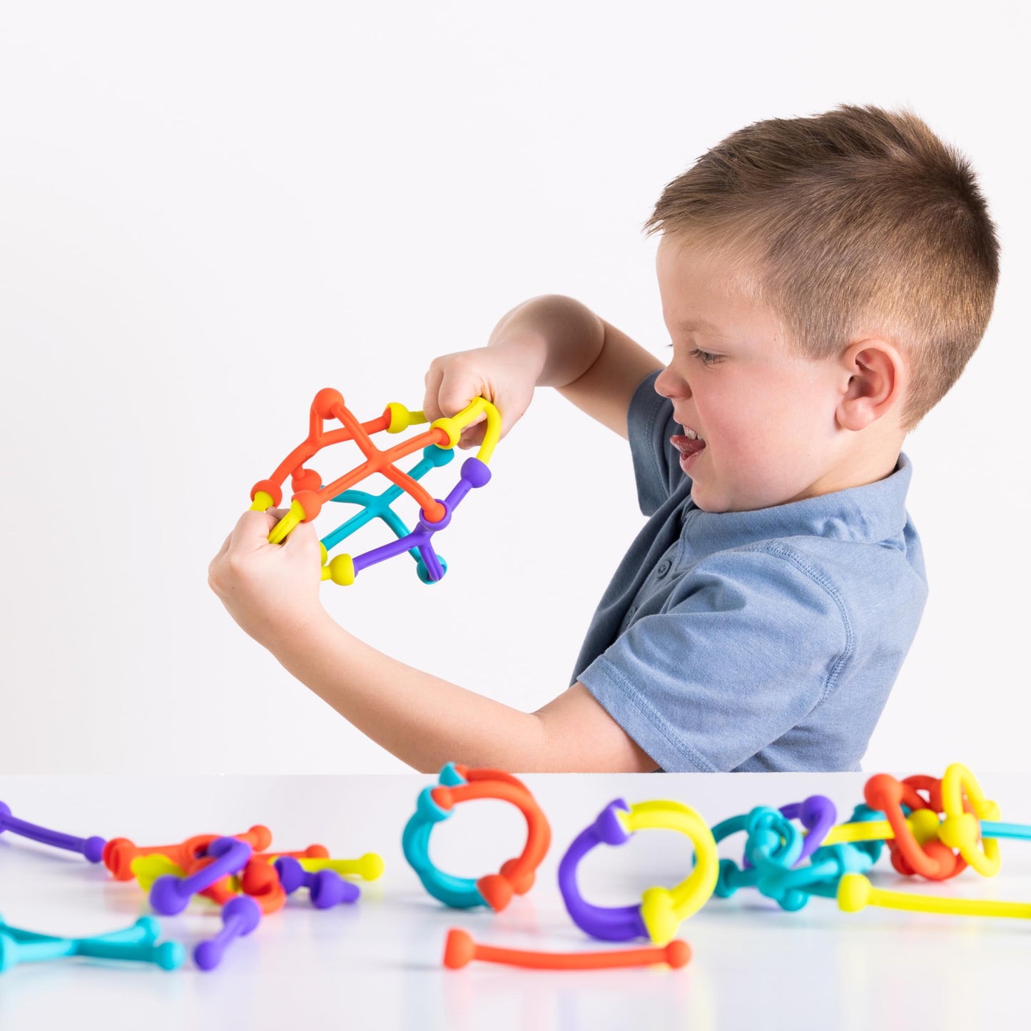 Fat Brain Toys Plip Kit | 52 Piece Bendy Silicone Link Toy Building Set in a Variety of Shapes