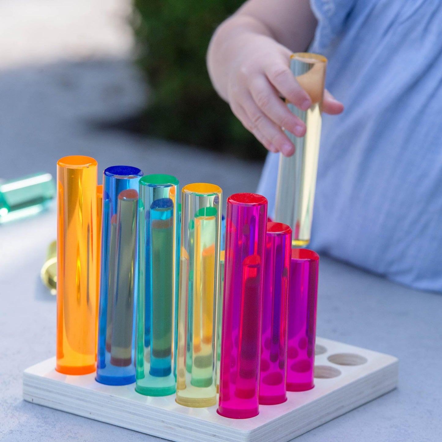 tickit Graduated Gem Columns Play Set with Wooden Storage Tray – 25 Translucent Acrylic Cylinders for Stacking, Colour Mixing, Measurement, Construction & Sensory Learning